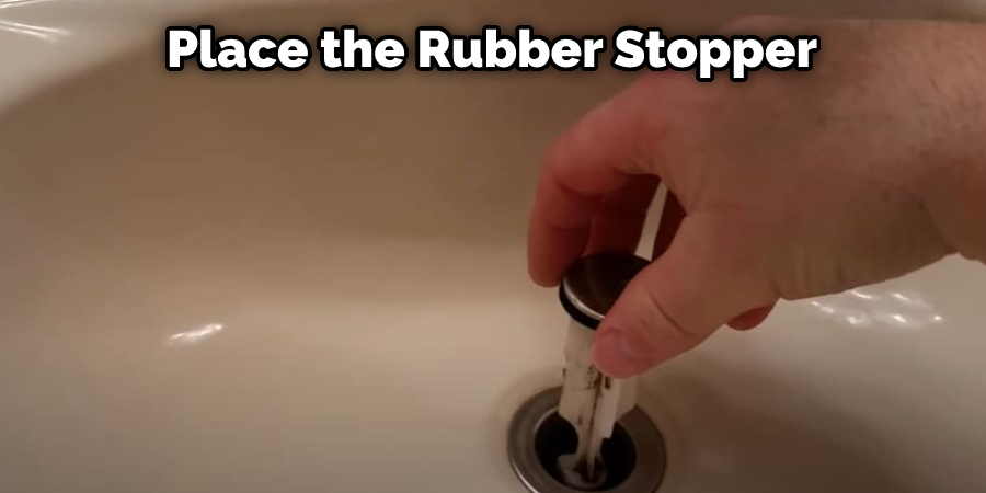 Place the Rubber Stopper