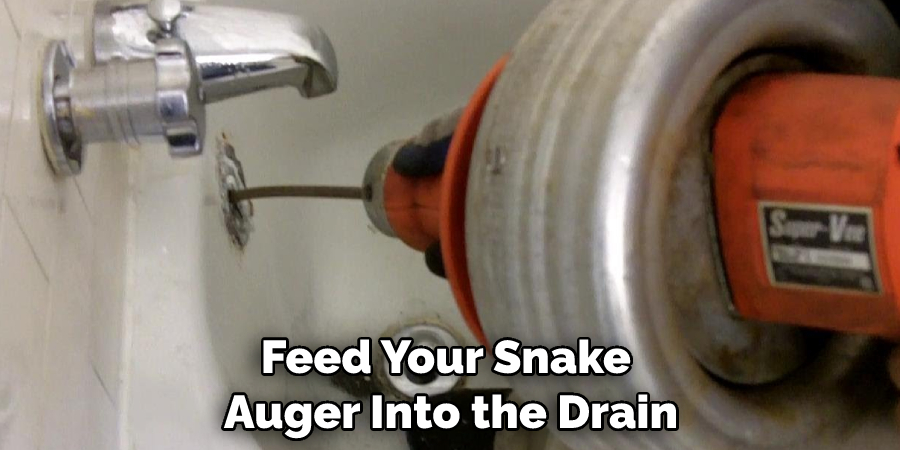 Feed Your Snake Auger Into the Drain