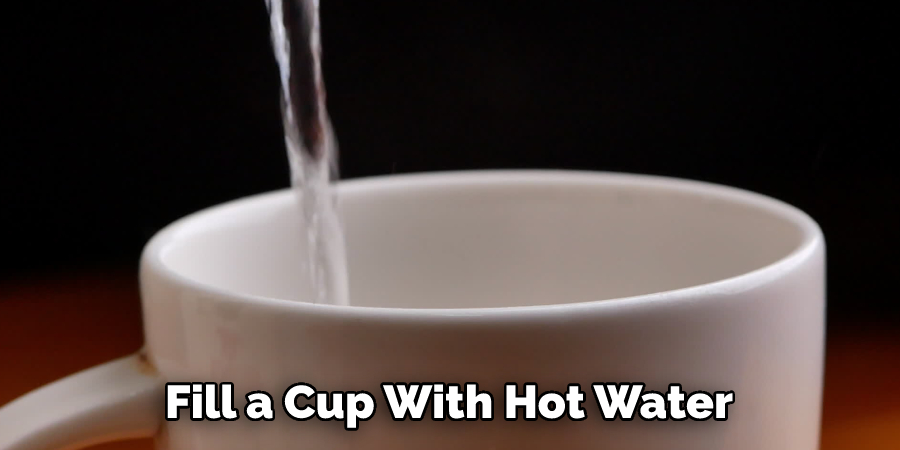 Fill a Cup With Hot Water