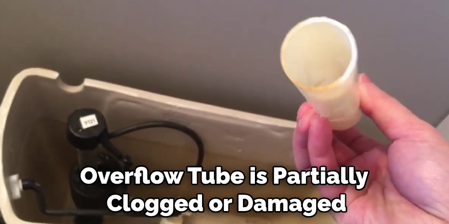 Overflow Tube is Partially Clogged or Damaged