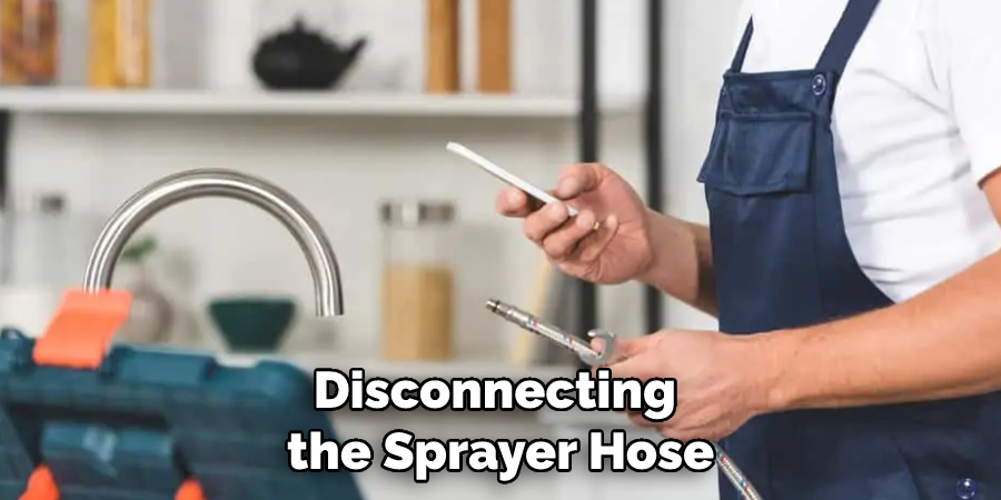 Disconnecting the Sprayer Hose