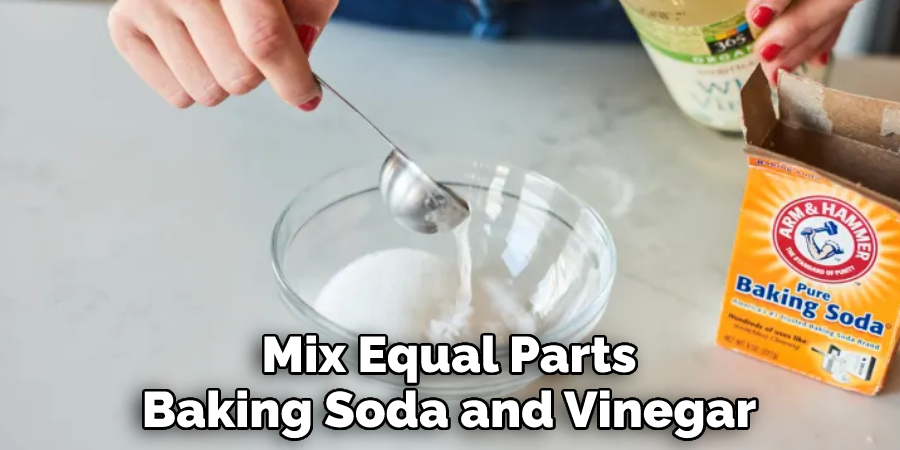 Mix Equal Parts Baking Soda and Vinegar