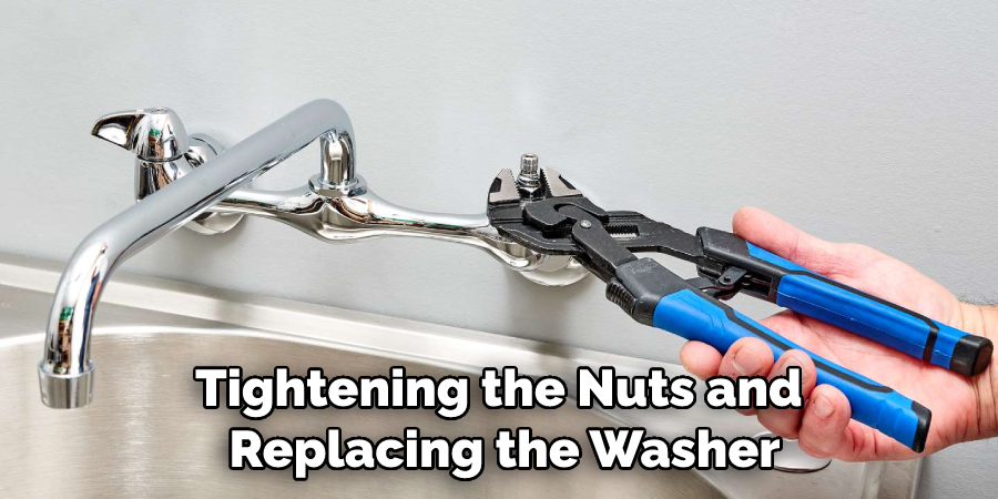Tightening the Nuts and Replacing the Washer