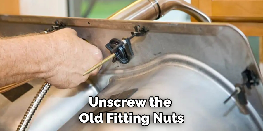 Unscrew the Old Fitting Nuts