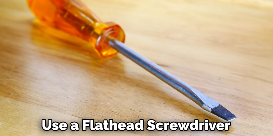  Use a Flathead Screwdriver 