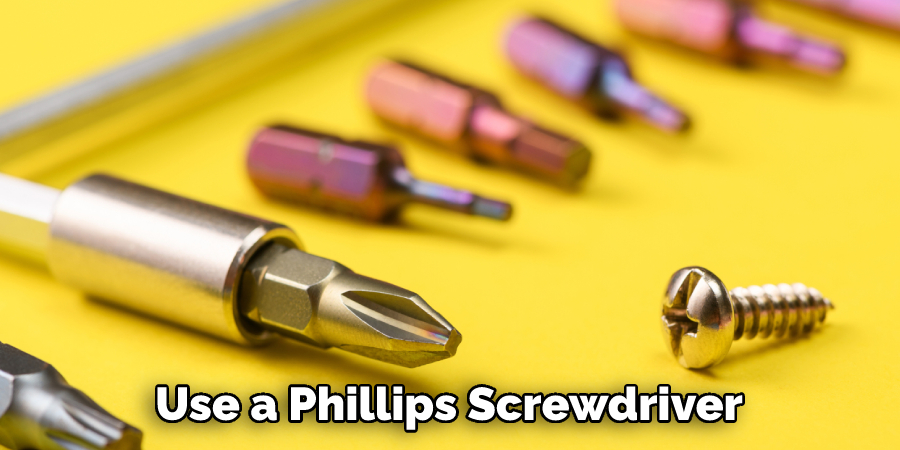 Use a Phillips Screwdriver