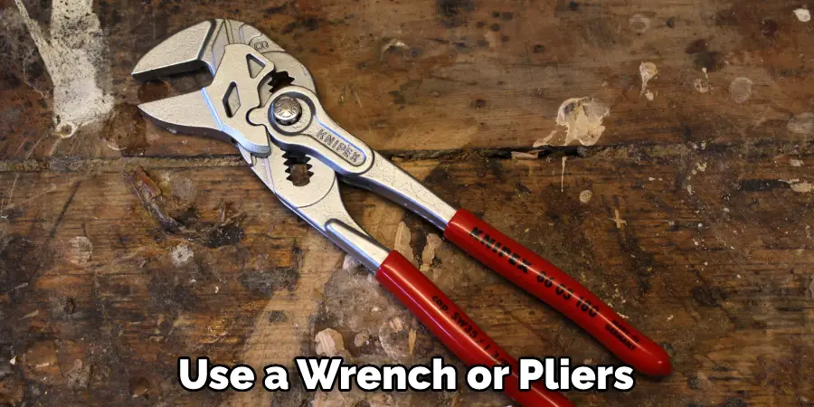 Use a Wrench or Pliers