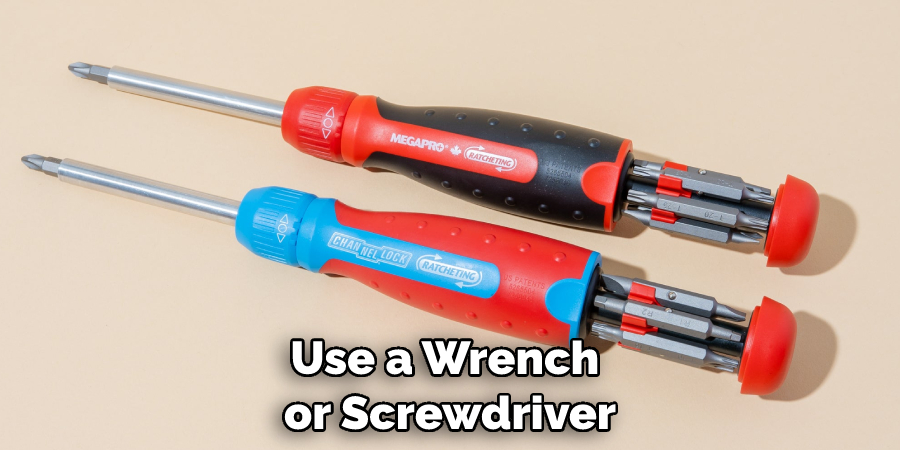 Use a Wrench or Screwdriver