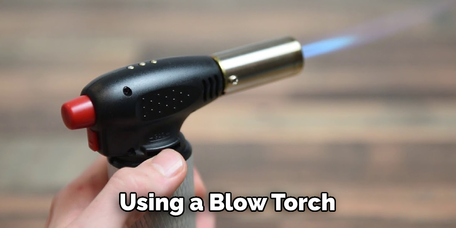 Using a Blow Torch