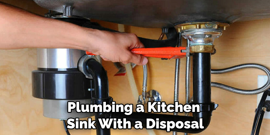 Plumbing a Kitchen Sink With a Disposal