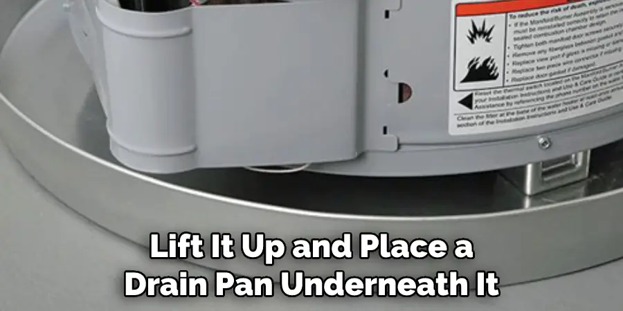 Lift It Up and Place a Drain Pan Underneath It