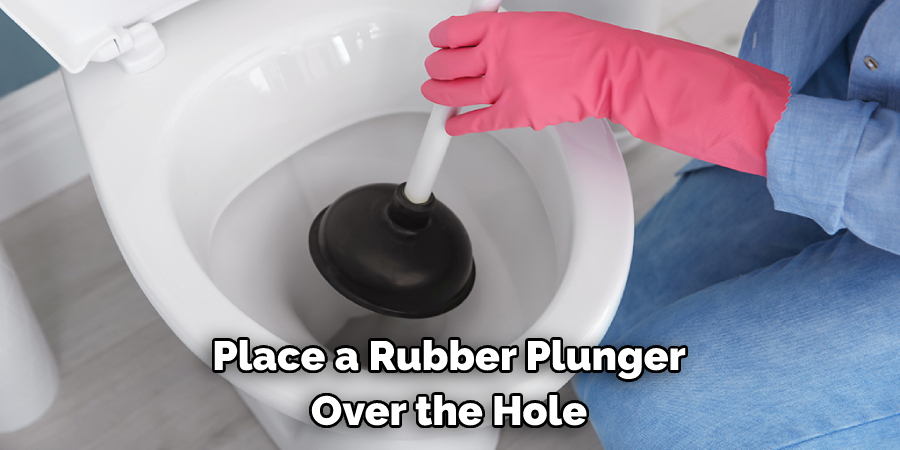 Place a Rubber Plunger Over the Hole