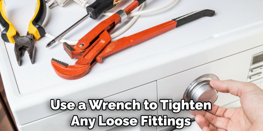 Use a Wrench to Tighten Any Loose Fittings