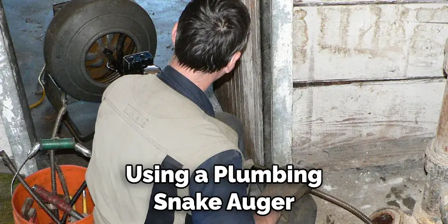 Using a Plumbing Snake Auger