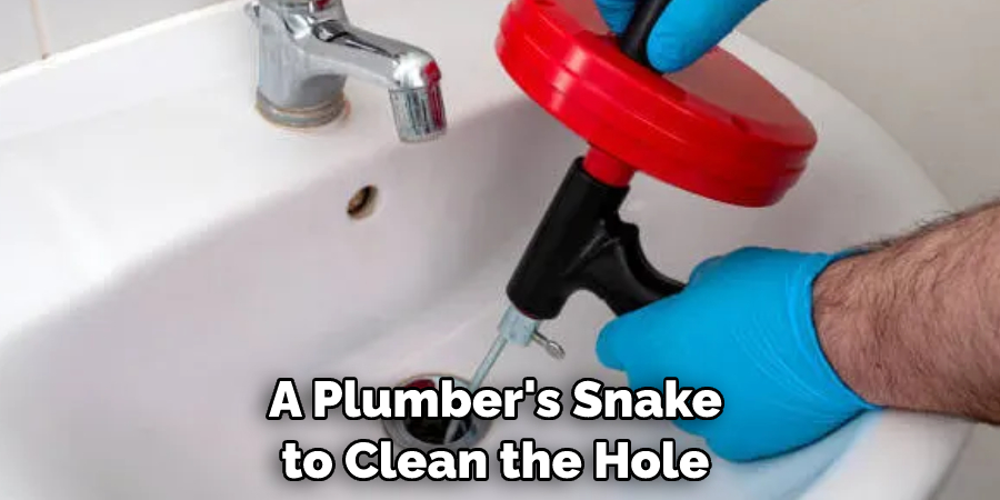 A Plumber's Snake to Clean the Hole