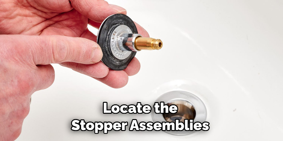 Locate the Stopper Assemblies