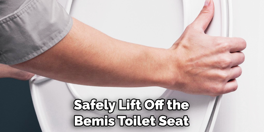 Safely Lift Off the Bemis Toilet Seat