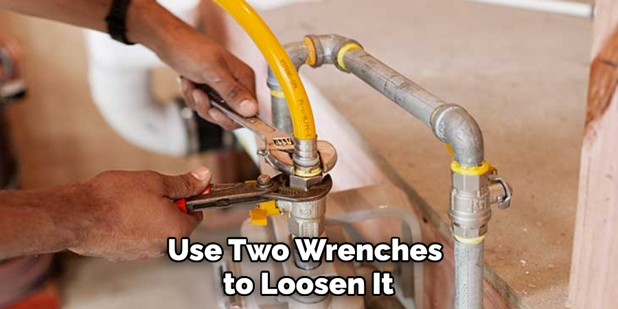 Use Two Wrenches to Loosen It