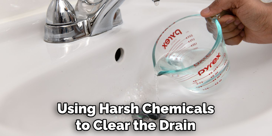 Using Harsh Chemicals to Clear the Drain