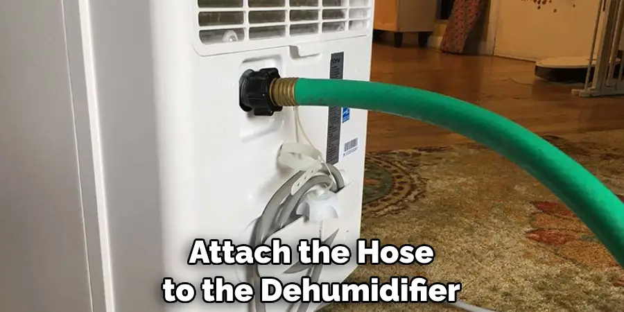 Attach the Hose to the Dehumidifier