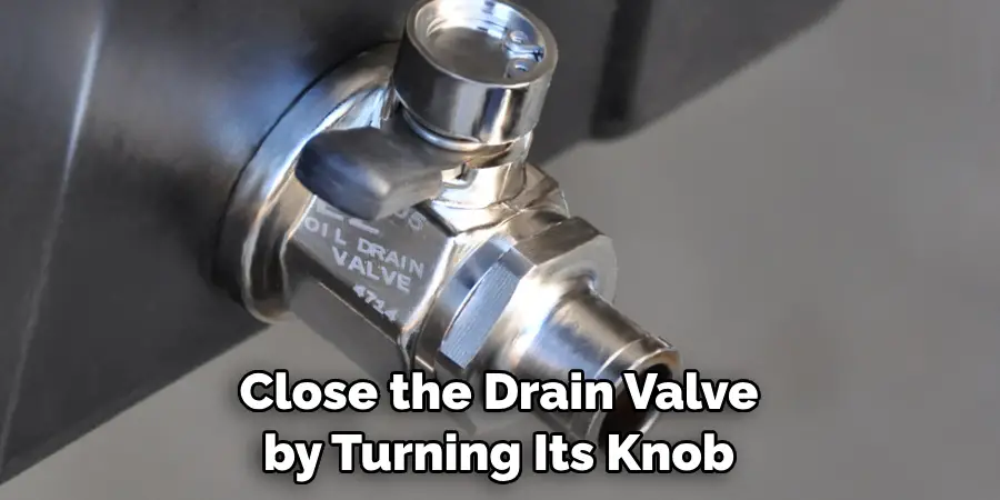 Close the Drain Valve by Turning Its Knob