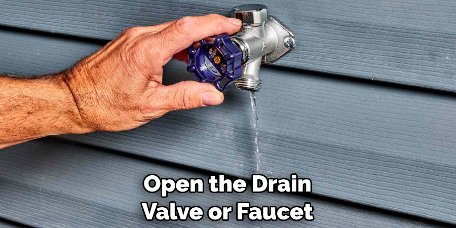 Open the Drain Valve or Faucet