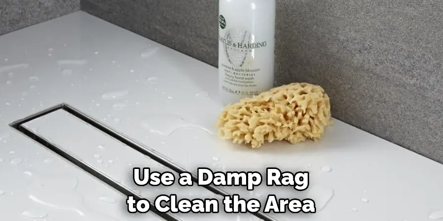 Use a Damp Rag to Clean the Area