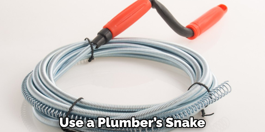 Use a Plumber’s Snake