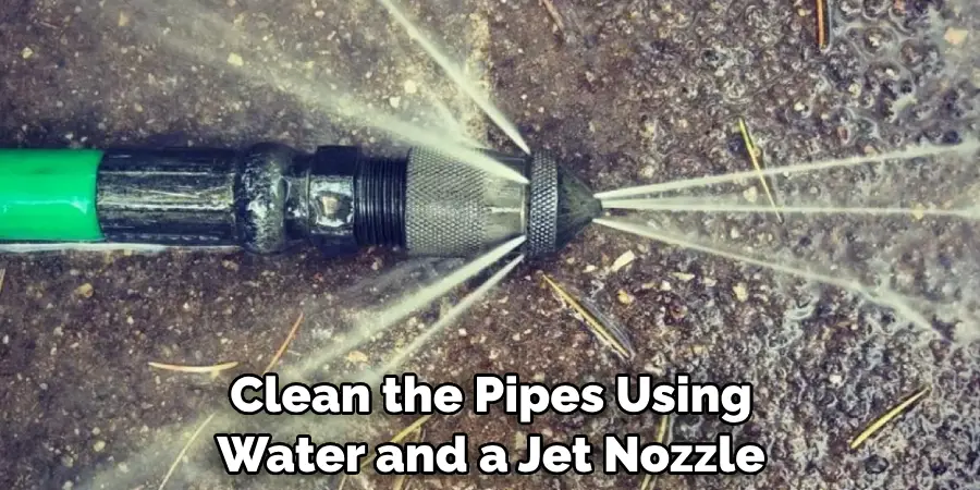 Clean the Pipes Using Water and a Jet Nozzle