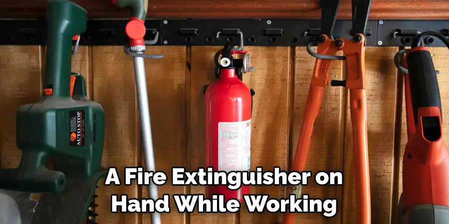 A Fire Extinguisher on Hand While Working