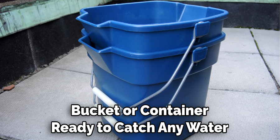 Bucket or Container Ready to Catch Any Water