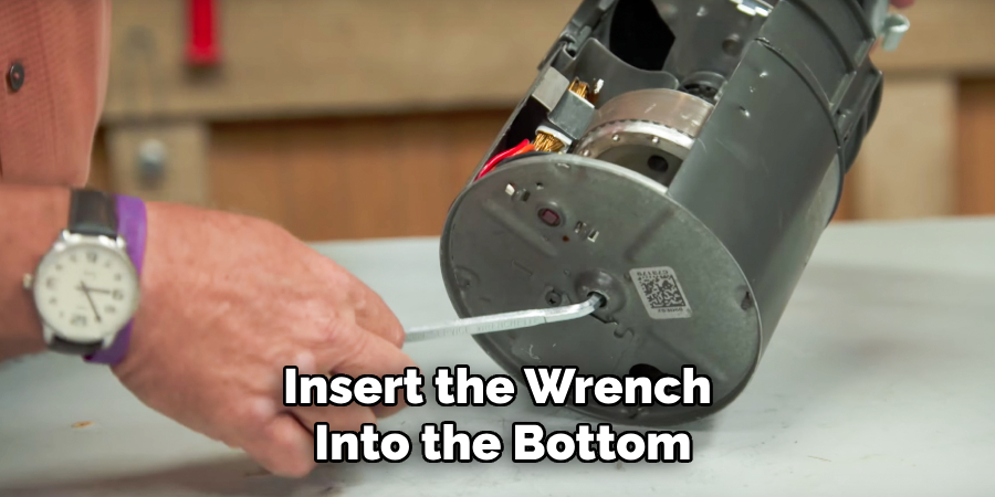 Insert the Wrench Into the Bottom