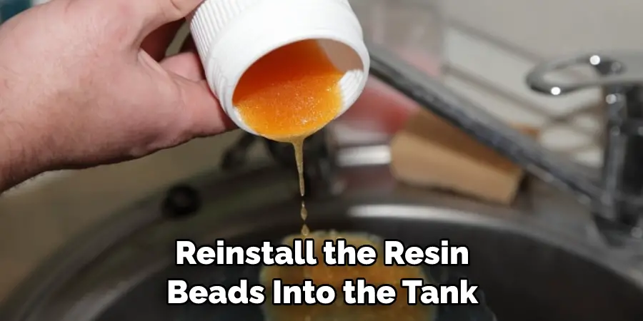 Reinstall the Resin Beads Into the Tank