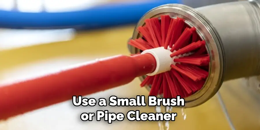 Use a Small Brush or Pipe Cleaner 