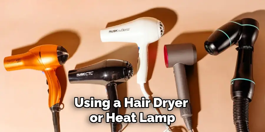 Using a Hair Dryer or Heat Lamp