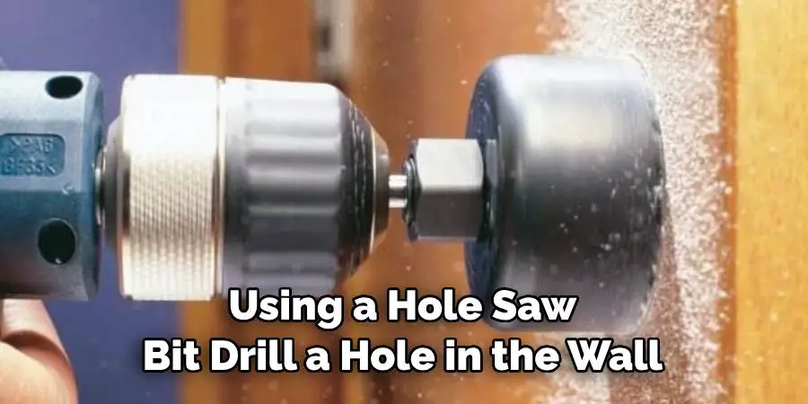 Using a Hole Saw Bit Drill a Hole in the Wall