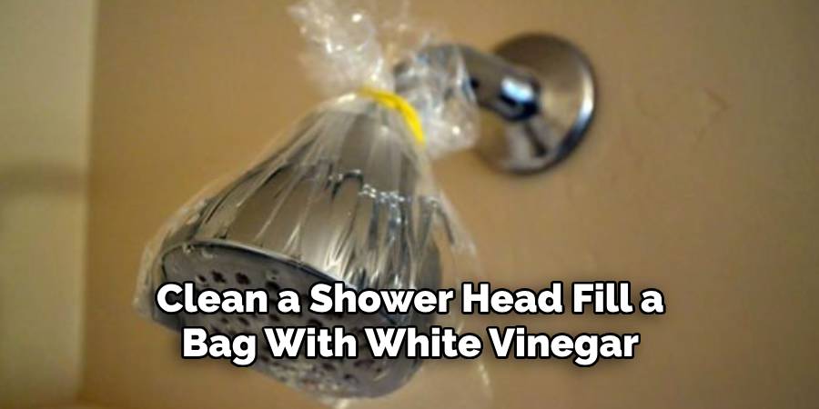 Clean a Shower Head Fill a Bag With White Vinegar