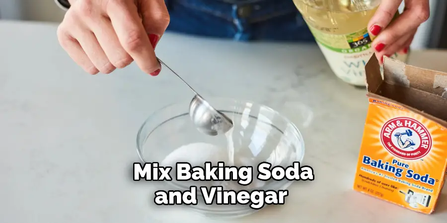 Mix Baking Soda and Vinegar 