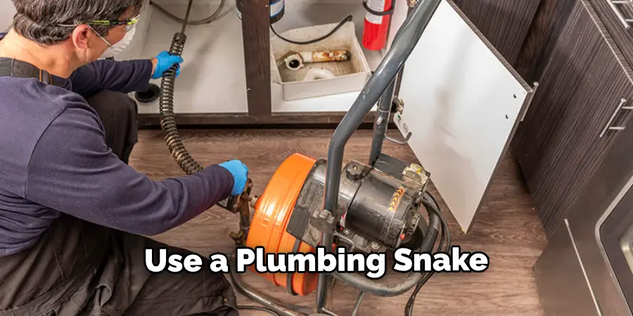 Use a Plumbing Snake