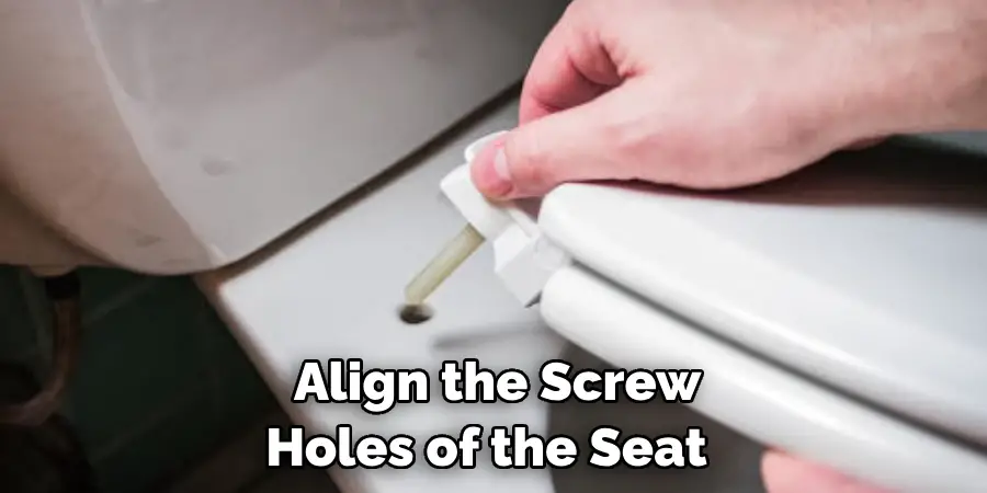 Align the Screw Holes of the Seat 