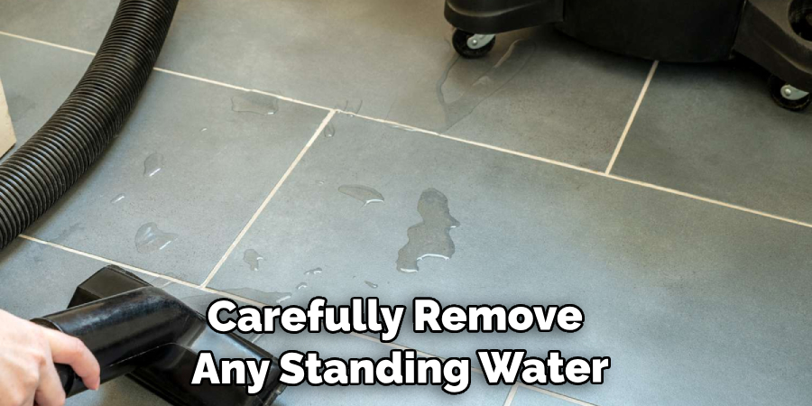 Carefully Remove Any Standing Water