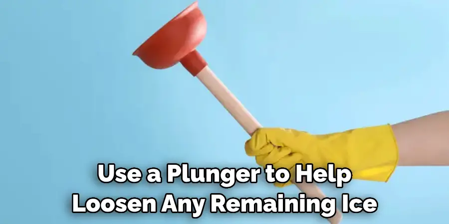 Use a Plunger to Help Loosen Any Remaining Ice 