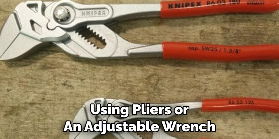 Using Pliers or An Adjustable Wrench