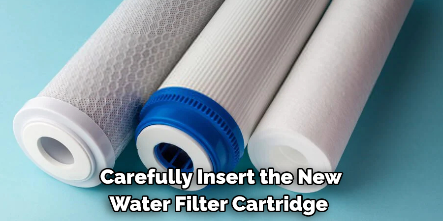Carefully Insert the New Water Filter Cartridge