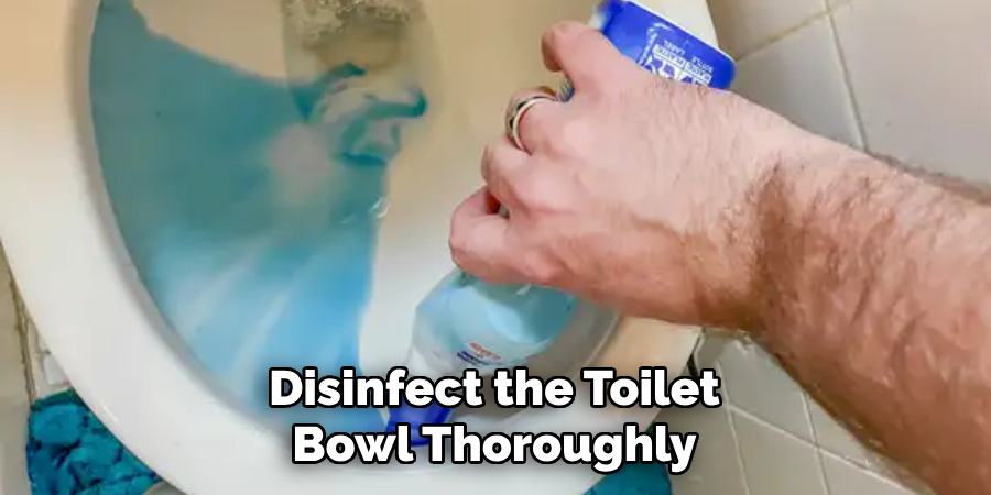 Disinfect the Toilet Bowl Thoroughly