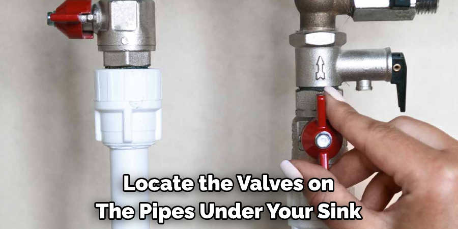 Locate the Valves on The Pipes Under Your Sink