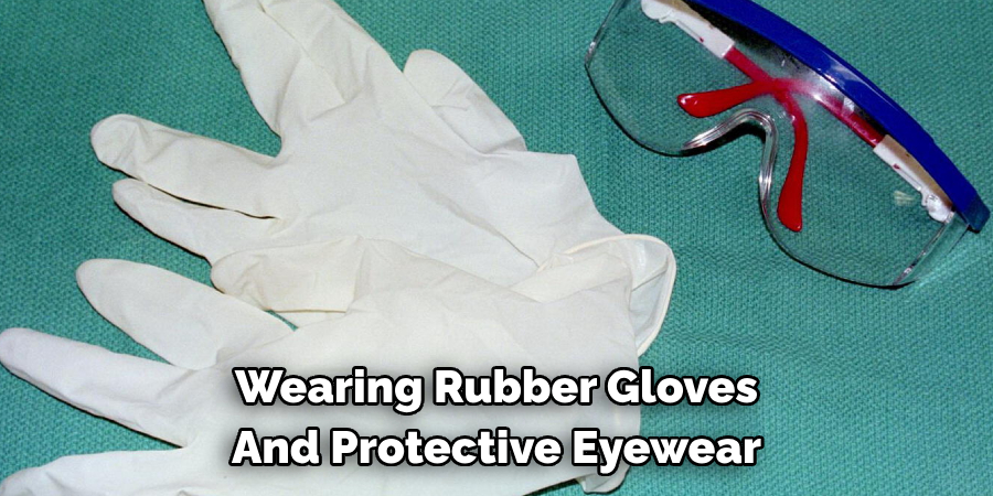 Wearing Rubber Gloves And Protective Eyewear