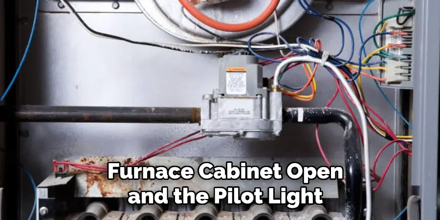 Furnace Cabinet Open and the Pilot Light