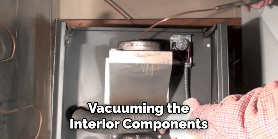 Vacuuming the Interior Components