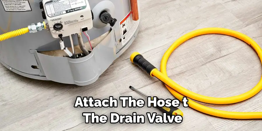 Attach the Hose to the Drain Valve